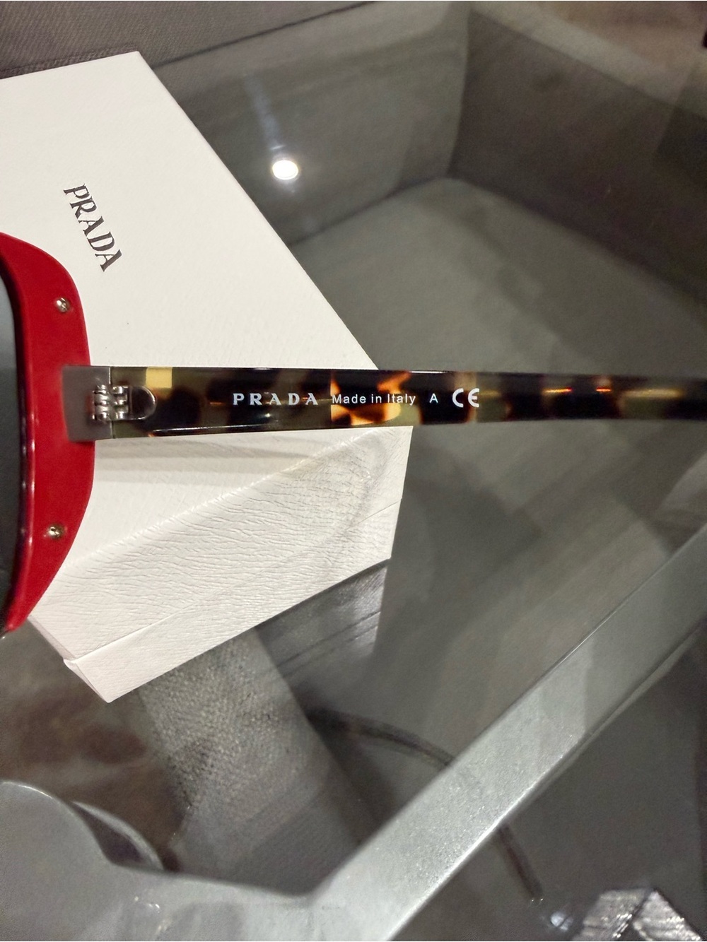Prada Silver Frame Sunglasses with Red Side Accents - Picture 4 of 8
